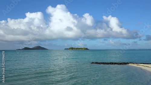 Aerial footage from a drone of blue lagoon and Motu Ahuna at Bora Bora island, Tahiti, French Polynesia, South Pacific Ocean (Bora Bora Aerial)
 photo