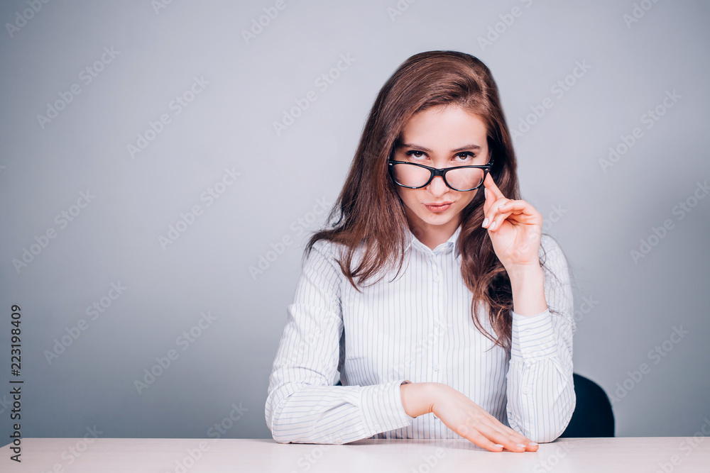 Attractive business lady with glasses with a smile Attractive business lady with glasses with a smile