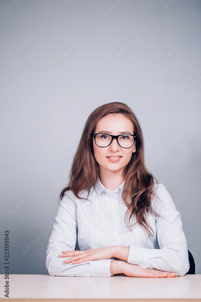 Successful happy business woman with charming smile looking at camera Successful happy business woman with charming smile looking at camera