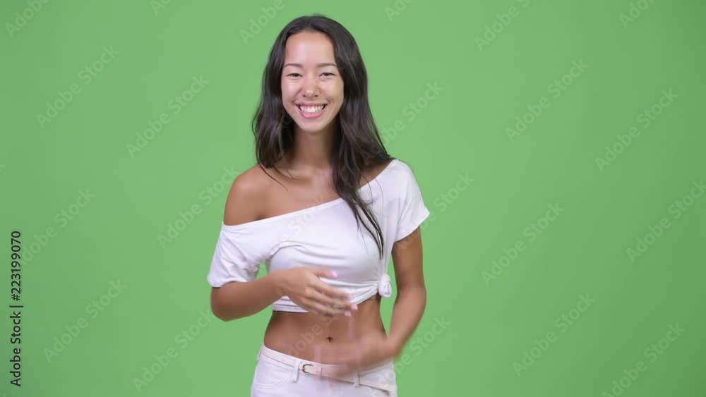 Young happy beautiful multi-ethnic woman laughing Young happy beautiful multi-ethnic woman laughing