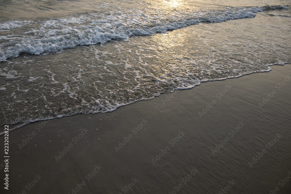 Orange sunset landscape with sea and beach sand. Sunset by the sea. Romantic evening seascape with sunset. Orange sunset landscape with sea and beach sand. Sunset by the sea. Romantic evening seascape with sunset.