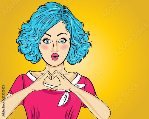 Pop art woman making heart sign with hands. Comic woman . Pin up girl.