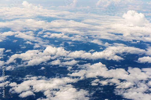 clouds and blue sky seen from plane