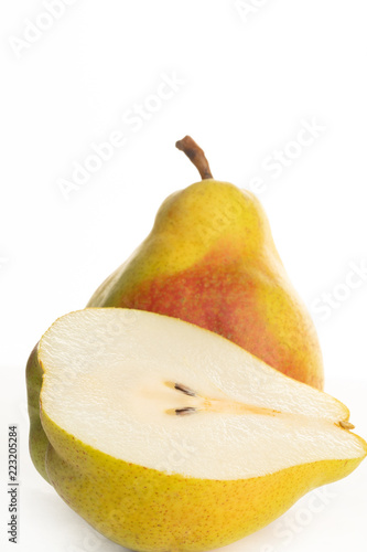 yellow ripe pear on white background
