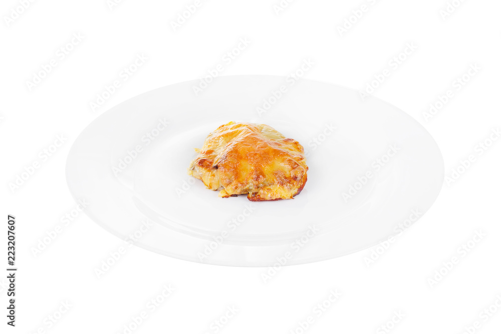 Meat, pork, beef, chicken, fish baked under a crust of mayonnaise and cheese on a plate, isolated on white background. Side view. Serving for a cafe, a restaurant in the menu Meat, pork, beef, chicken, fish baked under a crust of mayonnaise and cheese on a plate, isolated on white background. Side view. Serving for a cafe, a restaurant in the menu