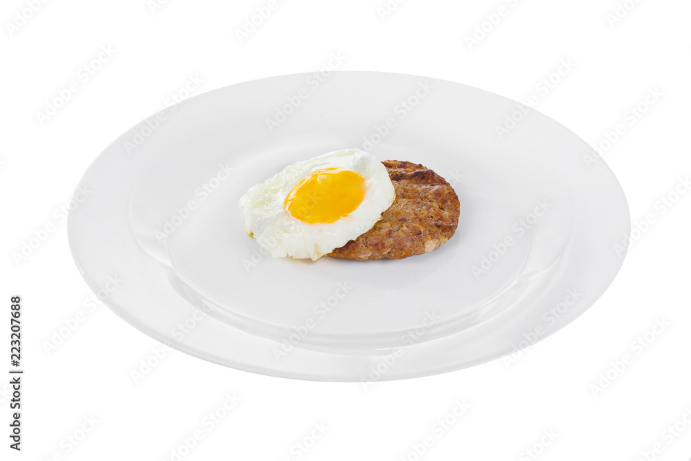 Cutlet, beef steak, lamb with scrambled eggs, on a plate, isolated white background. Side view. Serving for a cafe, a restaurant in the menu Cutlet, beef steak, lamb with scrambled eggs, on a plate, isolated white background. Side view. Serving for a cafe, a restaurant in the menu