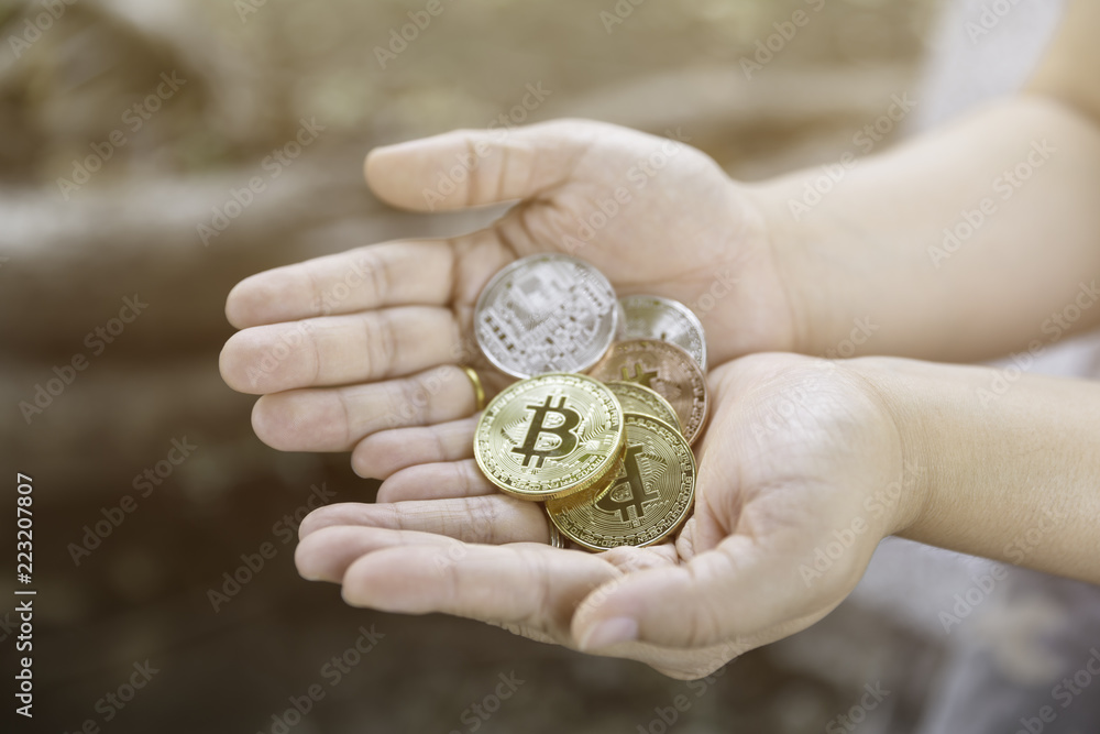 bitcoins in hand bitcoins in hand