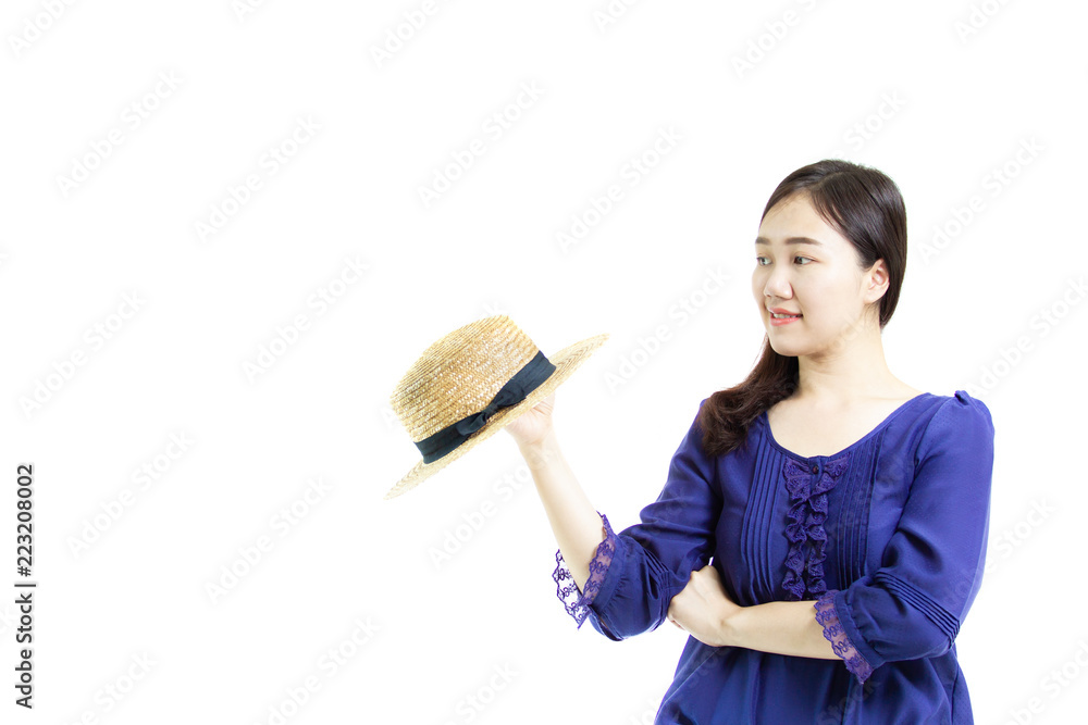 Beautiful portrait of Asian women in blue shirt holding a hat on her hand close up. Isolated on white background. Beautiful portrait of Asian women in blue shirt holding a hat on her hand close up. Isolated on white background.