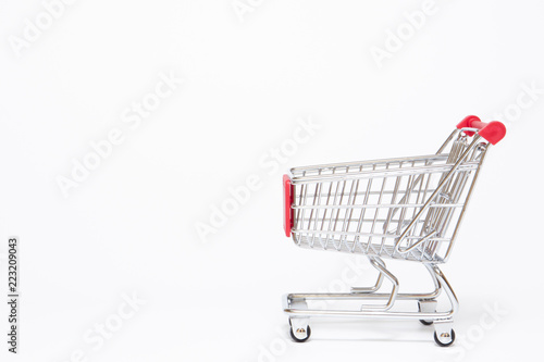 Basic style of shpping cart close up on white background. Copy space on left side for text or other use.