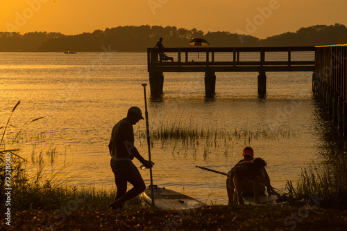 Stand up paddle boarders at dock on Hilton Head Island SC