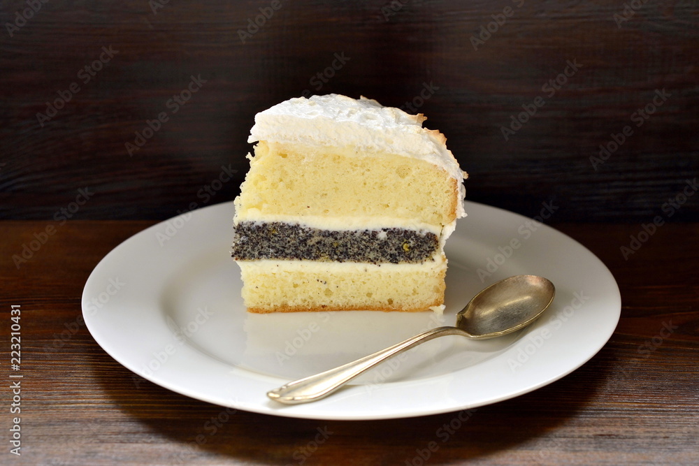 Lemon poppy seed sponge cake with curd cream and meringue Lemon poppy seed sponge cake with curd cream and meringue