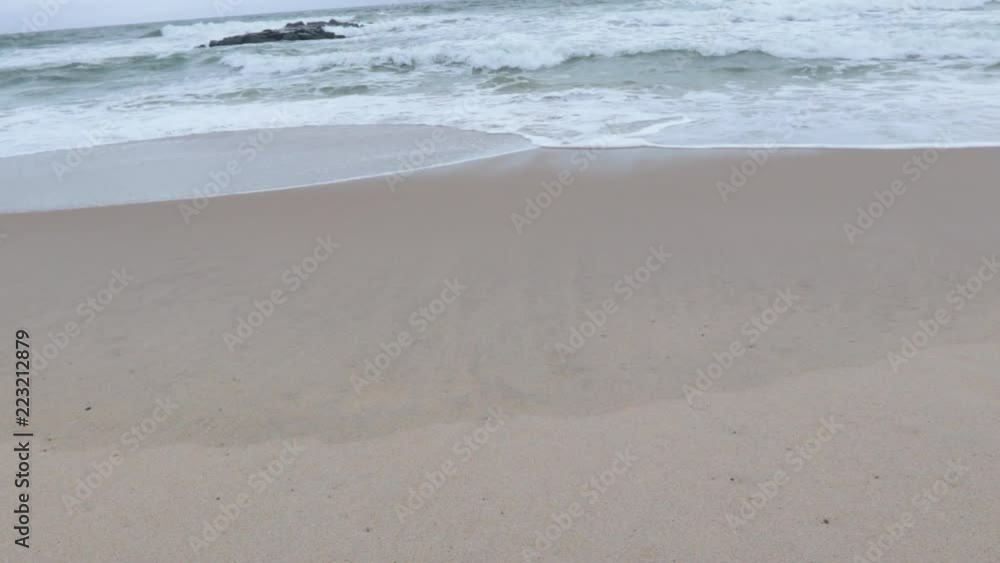 Beach and waves tilt up overcast Beach and waves tilt up overcast