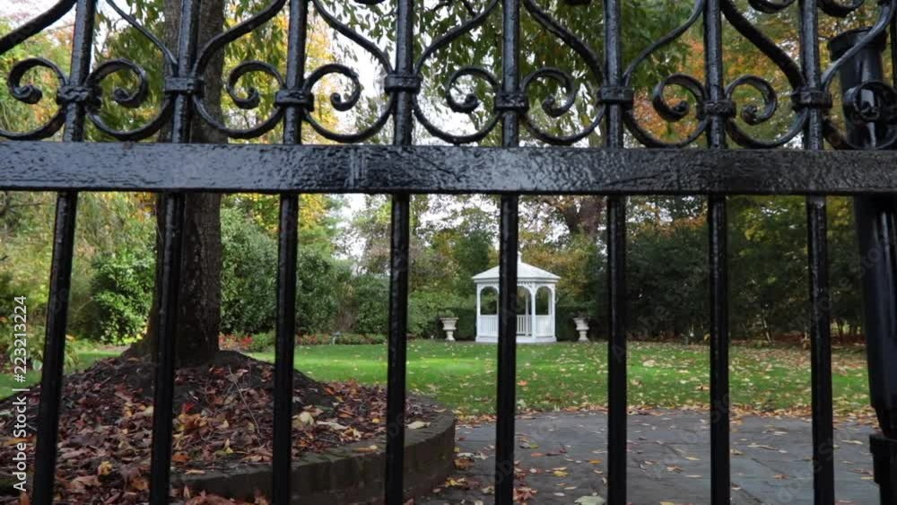 Iron gate trees and white gazebo background slider Iron gate trees and white gazebo background slider