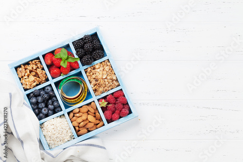 Healthy breakfast set with muesli, berries and milk