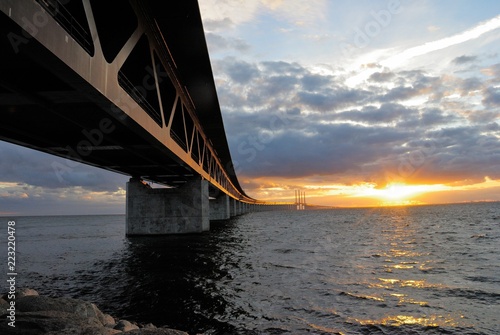 The Øresund (Oresund) Bridge seen from the Sweden side on sunset
