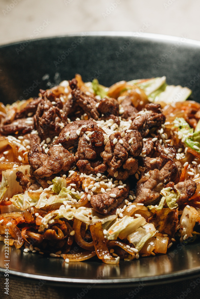 Delicious spicy noodles with meat in pot, traditional Aisan foo Delicious spicy noodles with meat in pot, traditional Aisan foo