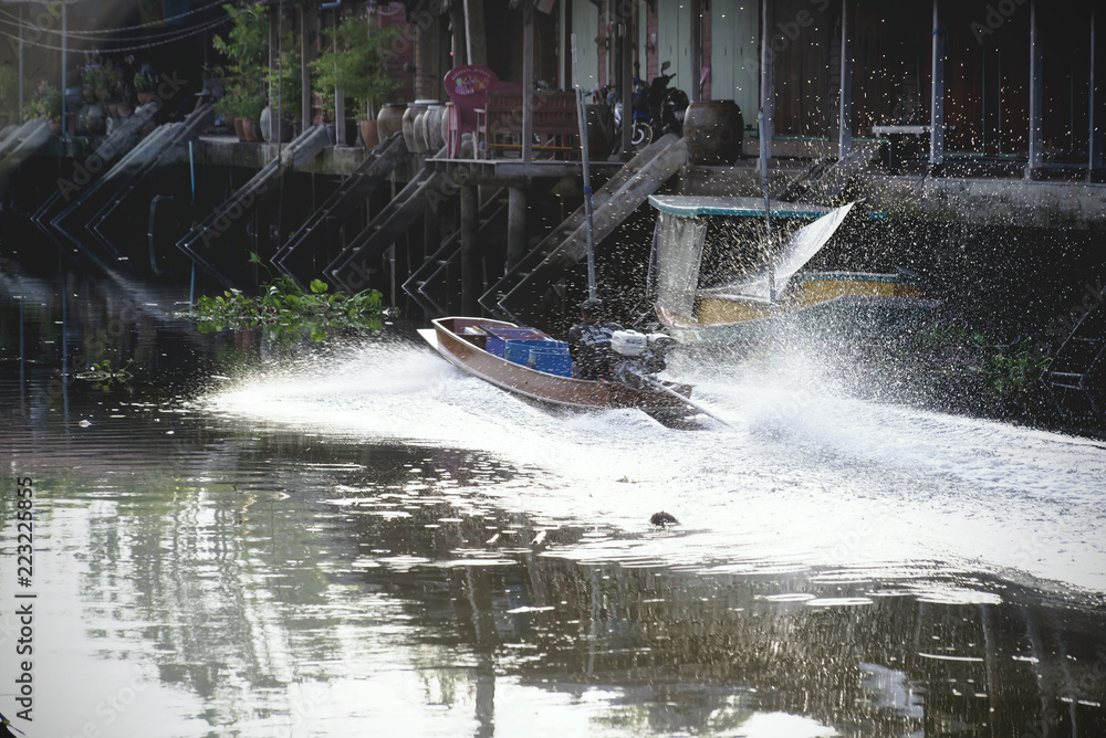 Fototapeta premium Speed boat in canal