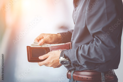 man hands holding wallet,empty wallet photo