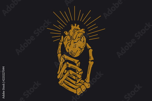 hand skeleton with torn heart