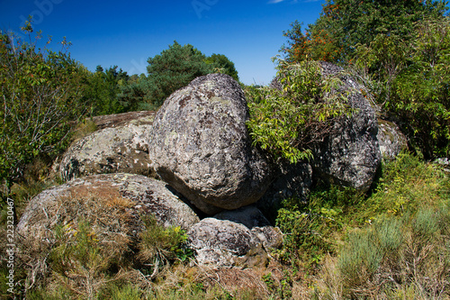 Stack of woolsack rocks or corestones, big rounded boulders, the result of chemical and physical weathering photo
