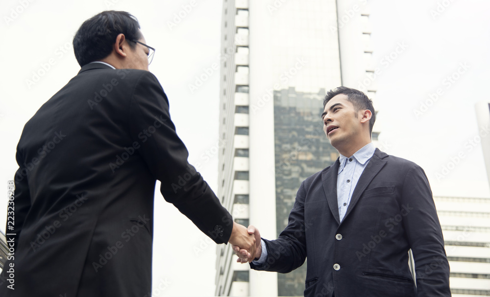 Businessman making handshake agreement. concept cooperation. panoramic banner with copy space. Businessman making handshake agreement. concept cooperation. panoramic banner with copy space.