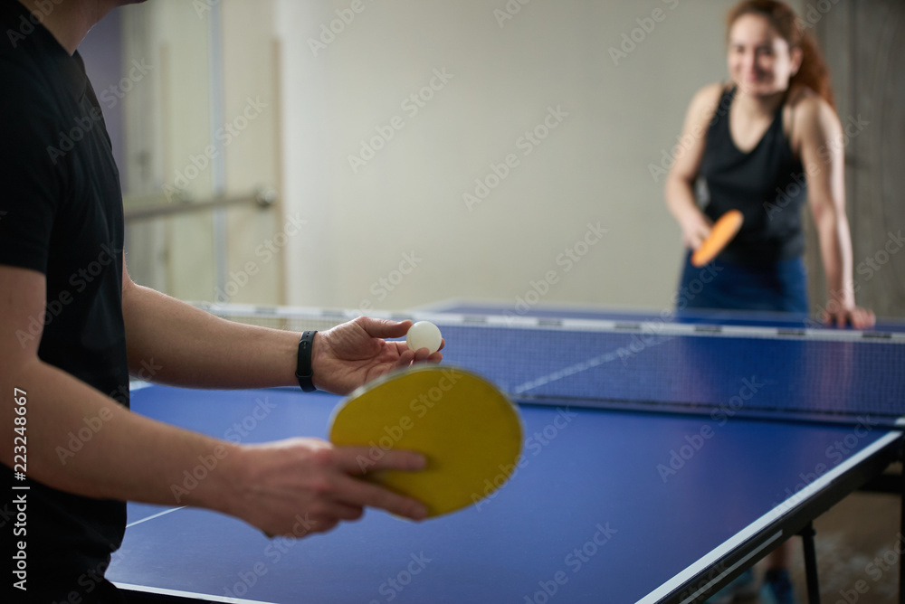 People playing ping pong tennis at gym room. Happy man and woman playing table  tennis Stock Photo | Adobe Stock