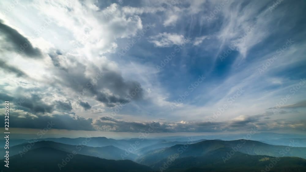 The picturesque mountain landscape on the cloud flow background. time lapse The picturesque mountain landscape on the cloud flow background. time lapse