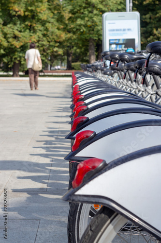 Wallpaper Mural Automatic parking and bicycle rental in the city park. Stop-sinal on the bicycle wheels Torontodigital.ca