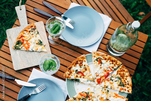 Gluten Free Pizza with mint infused water photo