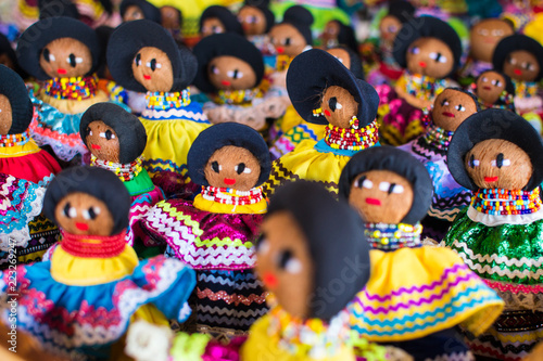Tela A group of colorful mexican dolls
