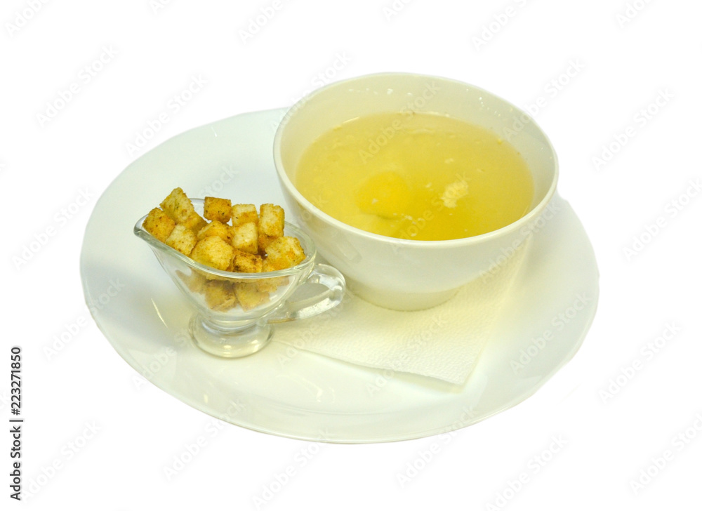 Chicken broth on a platter with crackers; Chicken broth on a platter with crackers;