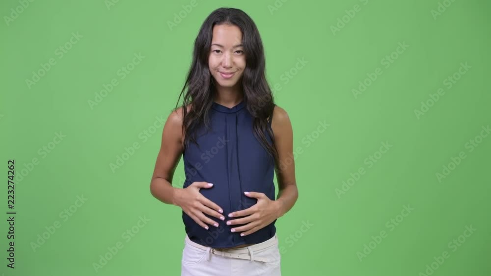Young happy pregnant multi-ethnic businesswoman Young happy pregnant multi-ethnic businesswoman