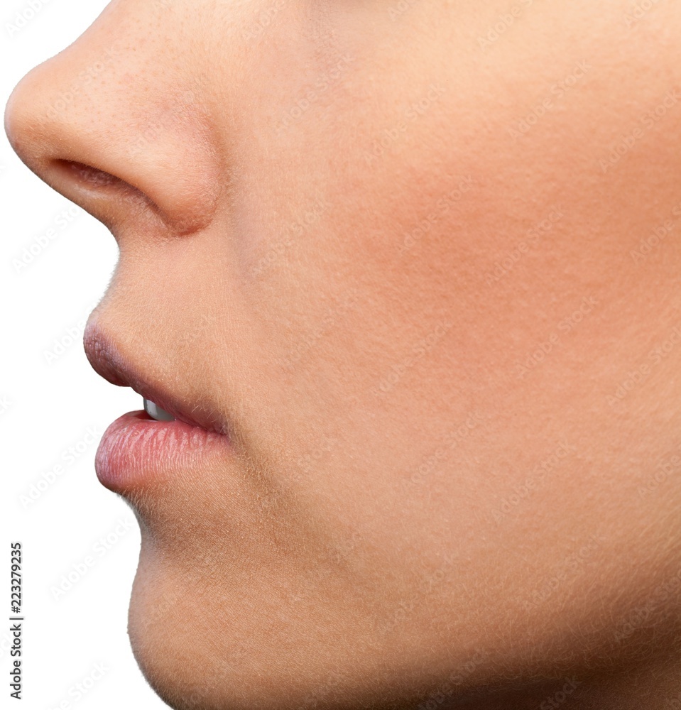 Closeup on a Woman's Mouth and Nose, Side View Closeup on a Woman's Mouth and Nose, Side View