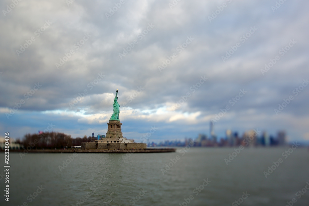 The statue of liberty shot on a cloudy day with a tilt shift lens