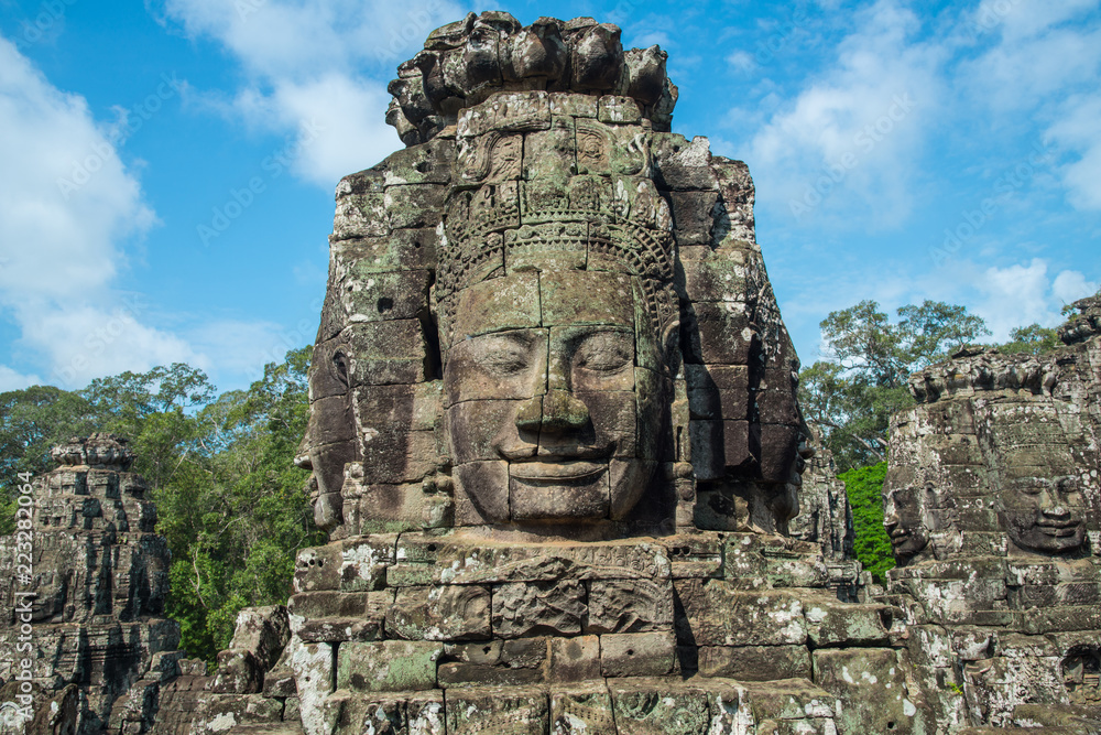The mystery face towers in Bayon temple, temple of King Jayavarman VII. The faces were believed to represent Brahma, the Hindu God of creation but some believe that it is the King himself.
