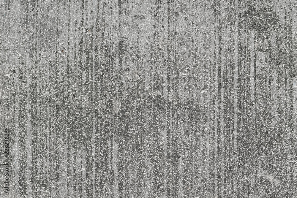 Gray cement wall texture, uneven surface with pattern, abstract background
Gray cement wall texture, uneven surface with pattern, abstract background