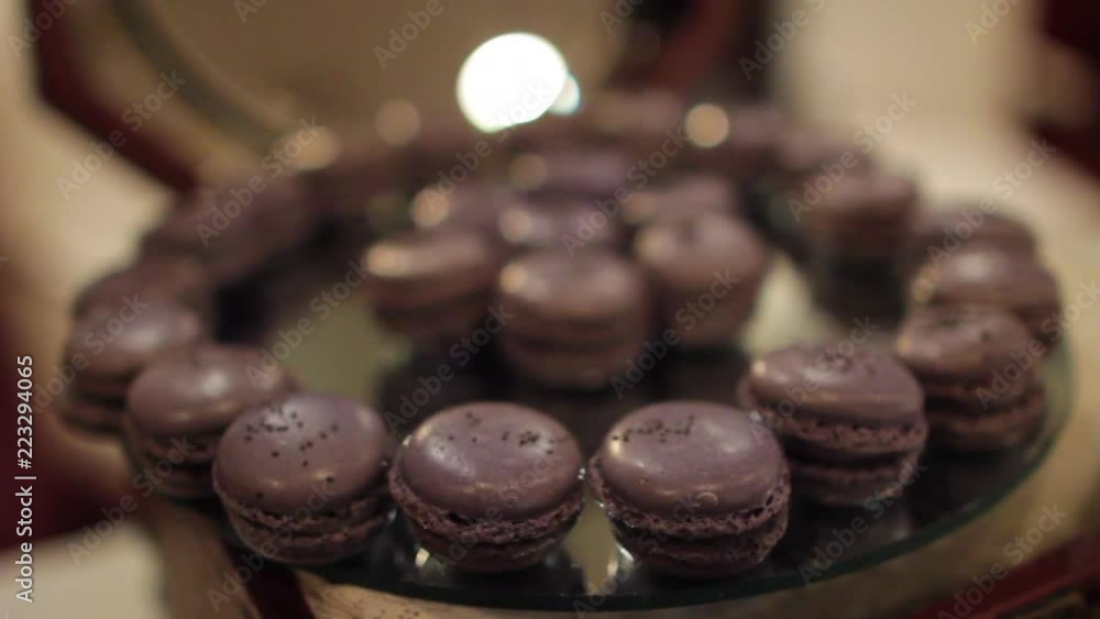 Chocolate meringue cookies on a tray rack focus Chocolate meringue cookies on a tray rack focus