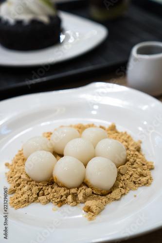 soft rice cake balls in soy powder and sugar syrup