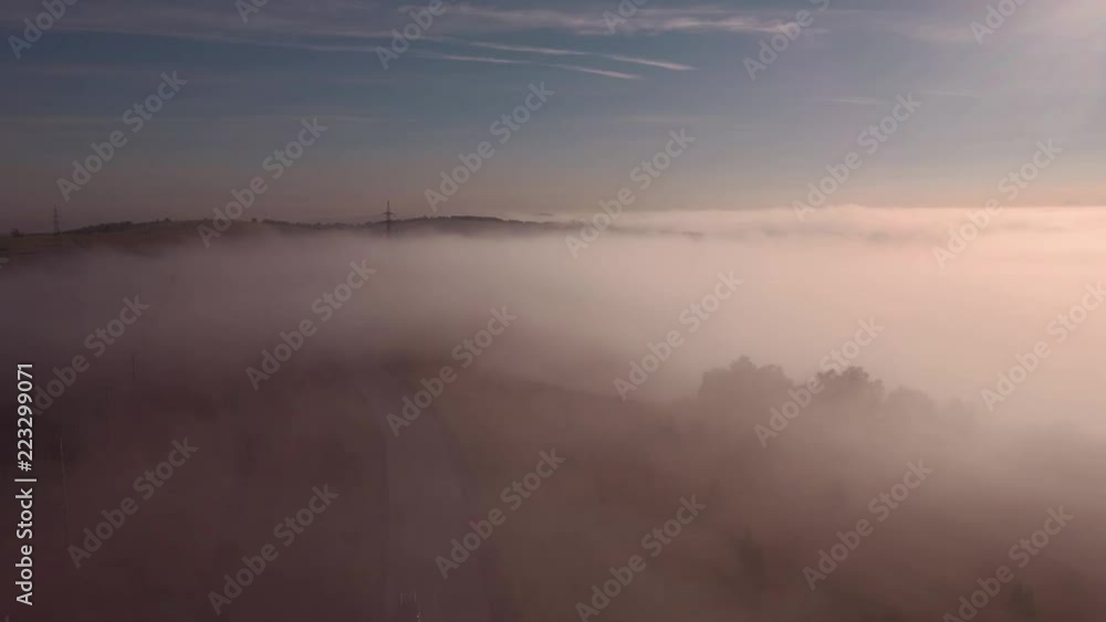 Flying over misty road in autumn rural countryside. 4K Flying over misty road in autumn rural countryside. 4K