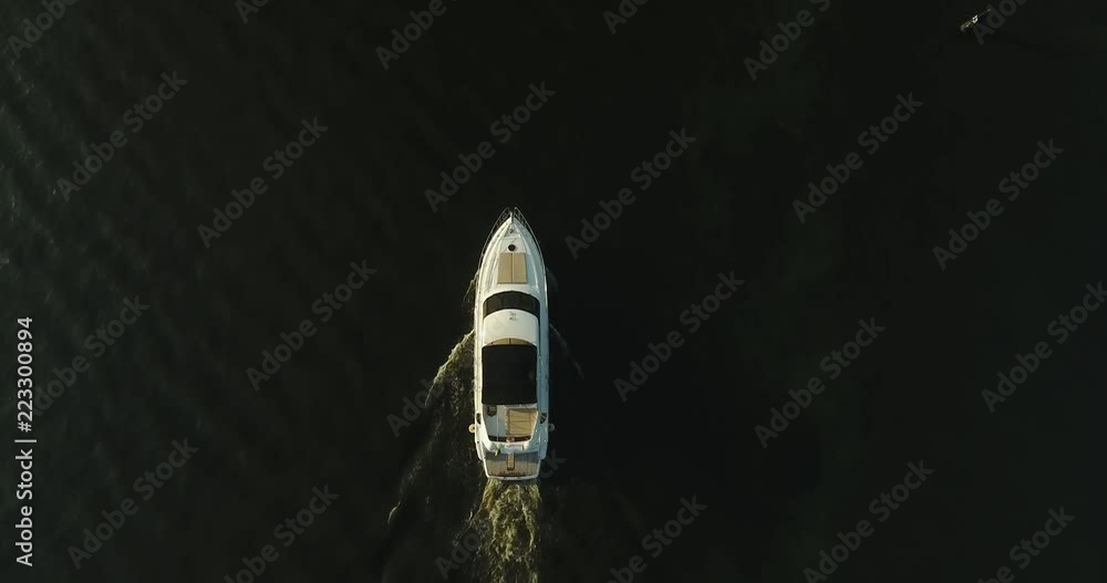 The Yacht Enters The Bay. Aerial Tilt Up The Yacht Enters The Bay. Aerial Tilt Up