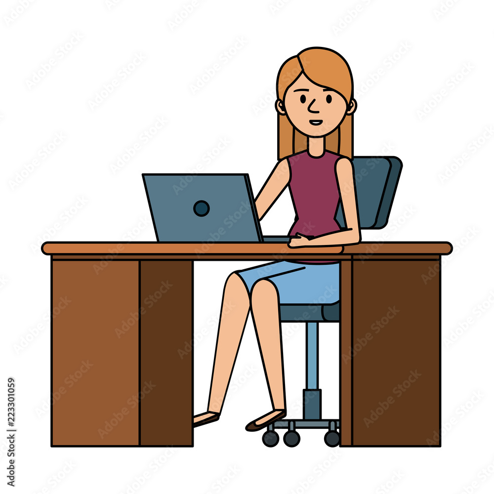 young woman at desk with laptop