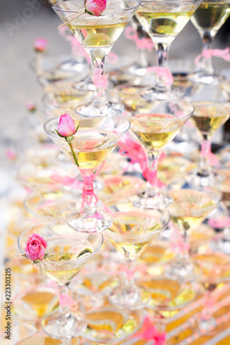 Pyramid from glasses of champagne on wedding ceremony
