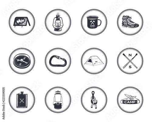 Set of 12 camping silhouette icons and symbols. Hiking equipment elements - tent, boot, lantern, compass. Stock vector adventure emblems isolated. Good for T-Shirt print, mugs, other identity