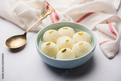 Indian Rasgulla or Rosogulla dessert/sweet served in a bowl. selective focus
