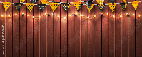 Halloween background with string light and Halloween buntings on wood background.Website spooky or banner template.Vector illustration EPS10