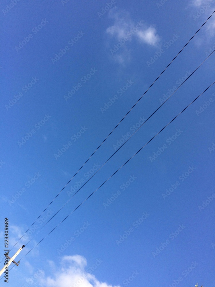 Cable power line blue sky background Cable power line blue sky background