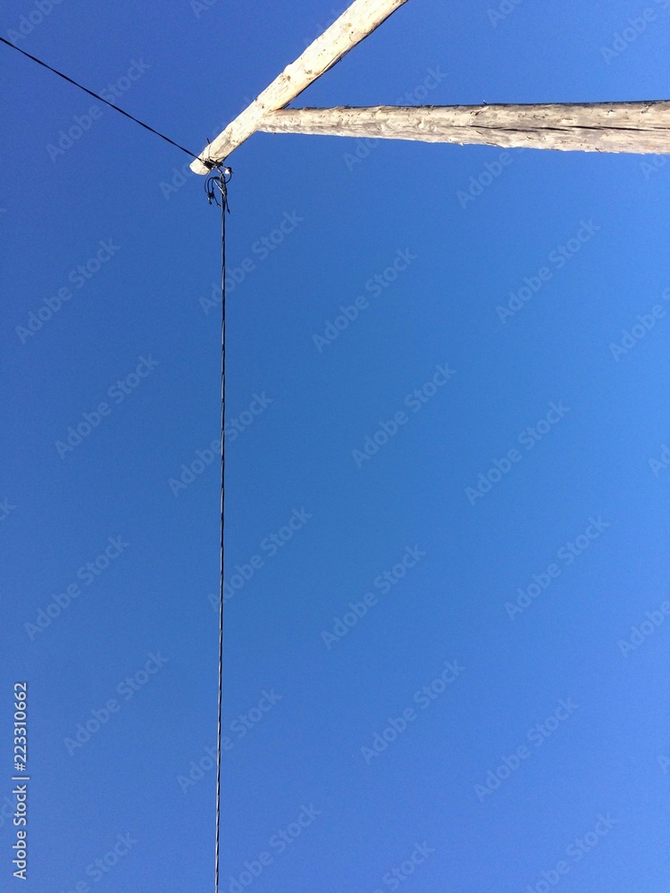 Obraz premium Cable power line blue sky background