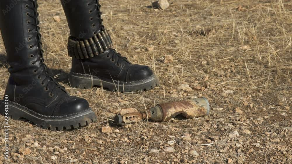 Exploded Artillery Mortar shell mine found by sapper biker woman Demining (Bomb disposal) mortar bomb. Exploded Artillery Mortar shell mine found by sapper biker woman Demining (Bomb disposal) mortar bomb.