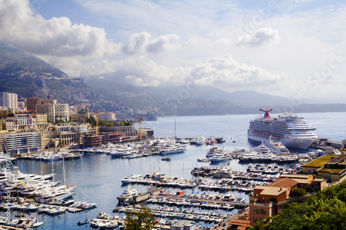 Monaco, Port. The port of Monaco is not only a trade or tourist connection with other countries and cities, it is also a great place to relax in the fresh air.