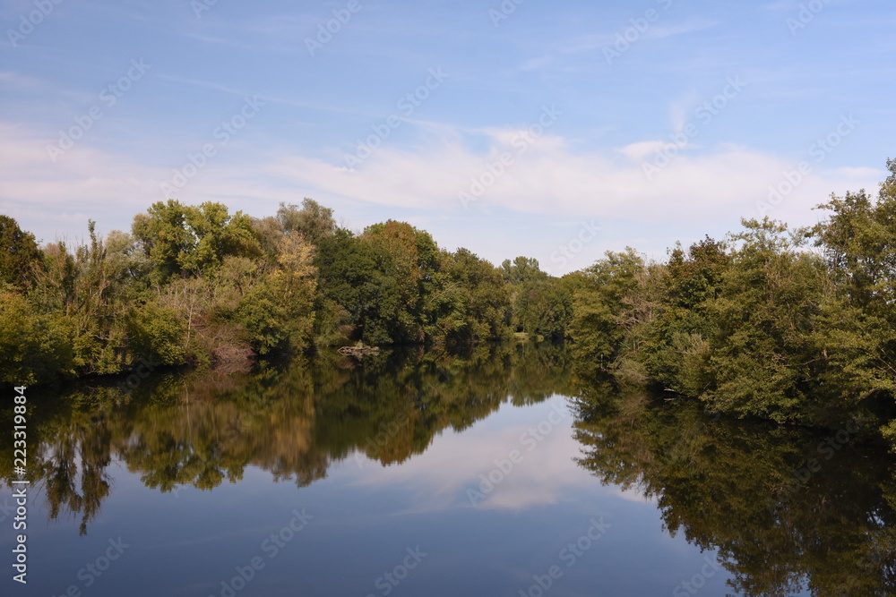Trees mirroring beautifully in Danube river, Germany. Trees mirroring beautifully in Danube river, Germany.